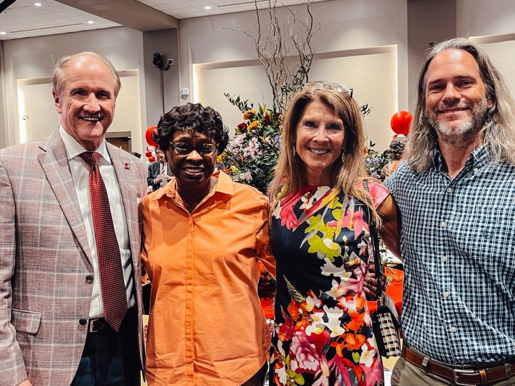 Photo of Beverly Nickerson with her supervisors and Dr. Bell at her Employee Service Recognition.